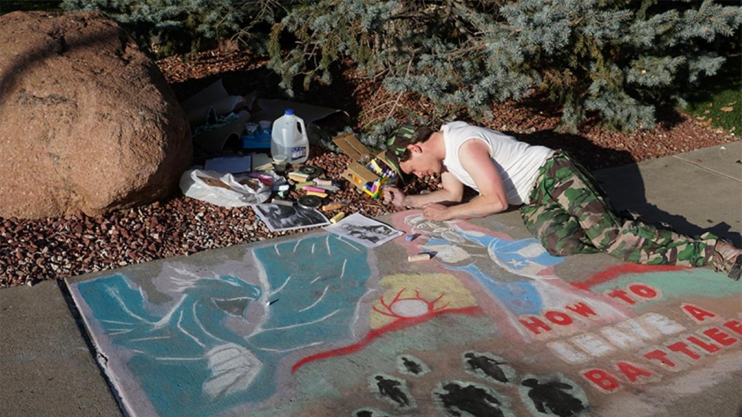 UROP Sidewalk Symposium - student completing chalk piece