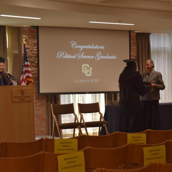 Student accepting diploma