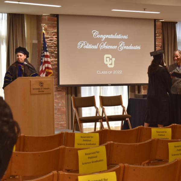 Student accepting diploma