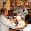 Three scientists talking