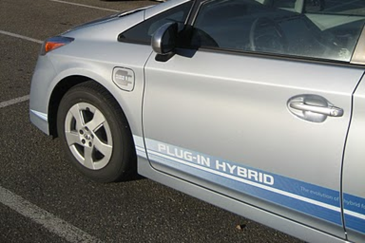 A hybrid electric car parked outside the Engineering Center.