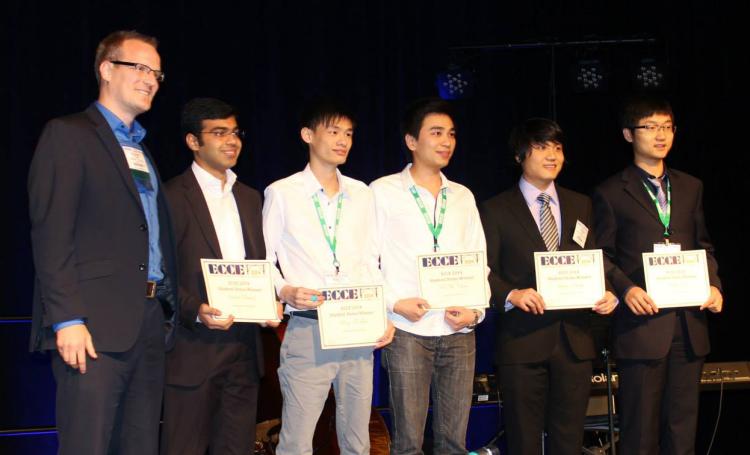 Saad Pervaiz (second from left) accepts his award