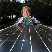 Bob Erickson with solar panel