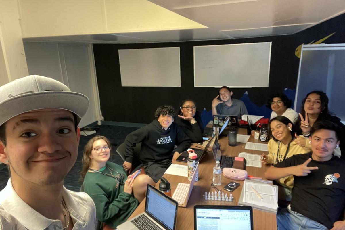Precollege students together in a study room.