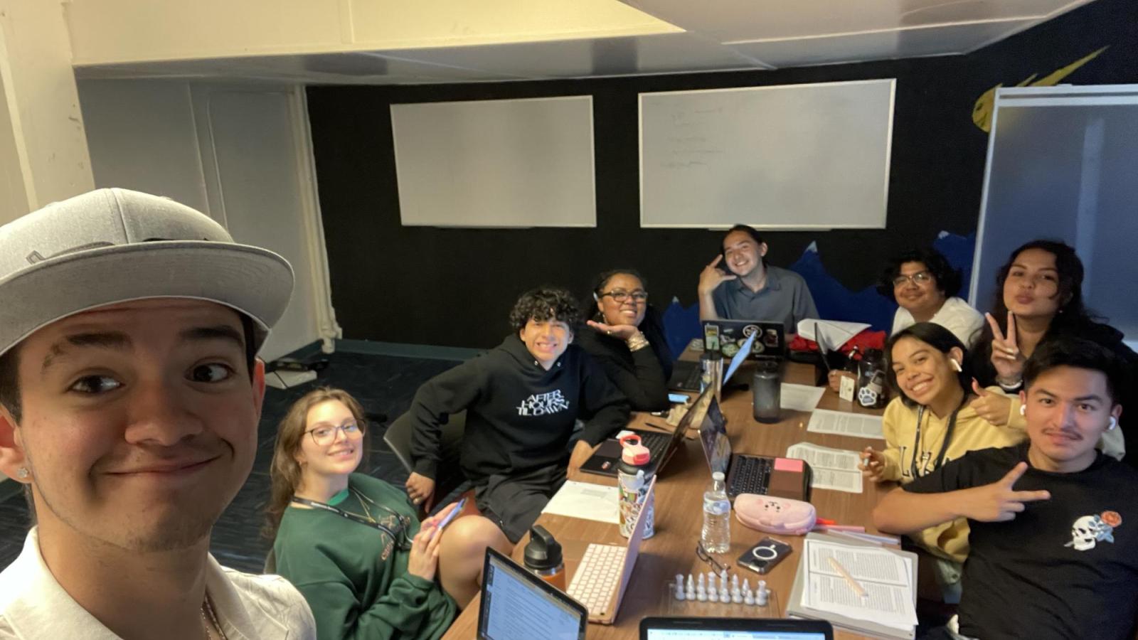 Group picture of Precollege students working together in a classroom.