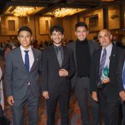Sonia DeLuca Fernández, three Denver Scholarship Foundation students, Chris Pacheco and Bob Boswell at the DSF gala
