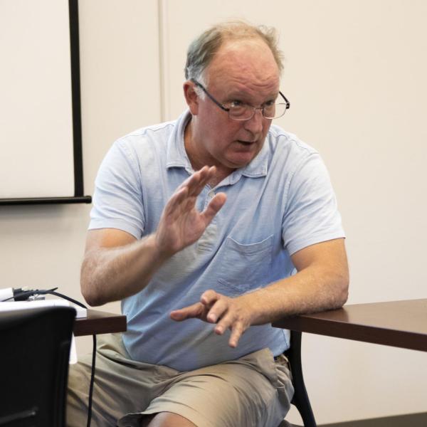 Professor Michael Stoner addresses the class.
