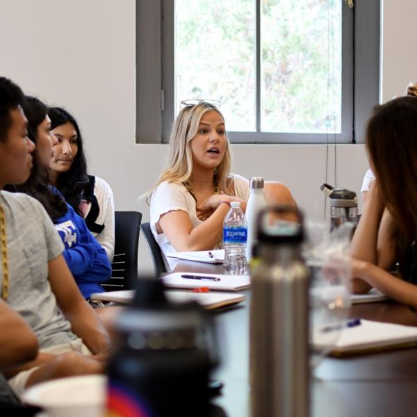 Katie Heisman responds to Ruth Hickerson during a communications session.