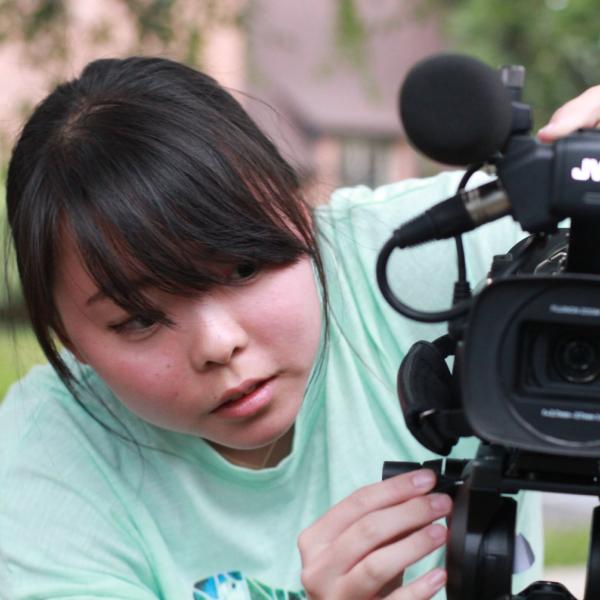 Kristin Jihye Oh playing with video camera during Broadcast I session