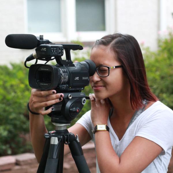 Aabriti Shrestha playing with video camera during Broadcast I session