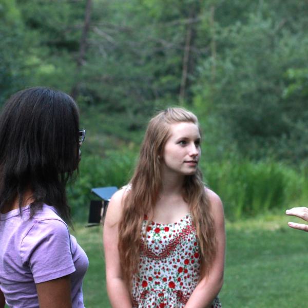 Jacqueline Lee and Anna Ritz working with Instructor Paul Daugherty during Broadcast session