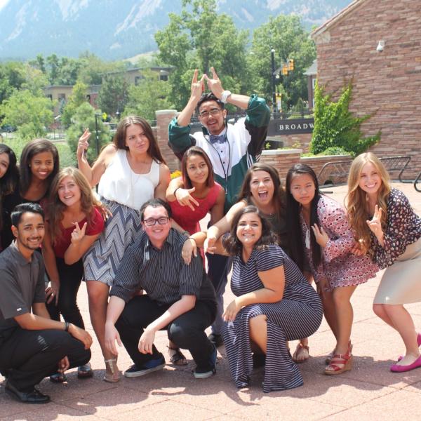 Intensive members pose for a funny group picture in front of the Flatirons