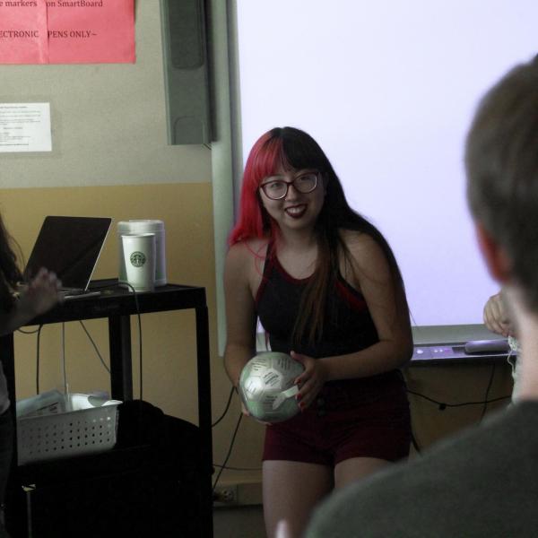 Alondra Carlos-Ferrales answers a question during an ice breaker game.