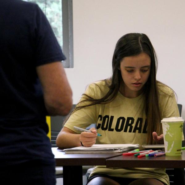 Lauren Irwin takes notes during a session on academic skill building.