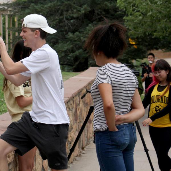 Bobby Berry films his classmates during a video session.