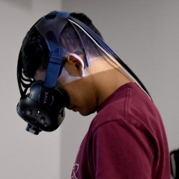 Andrew Patra uses a virtual reality headset during a DCMP session.
