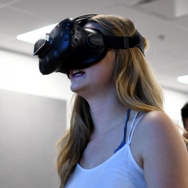 Bre Taylor uses a virtual reality headset during a DCMP session.