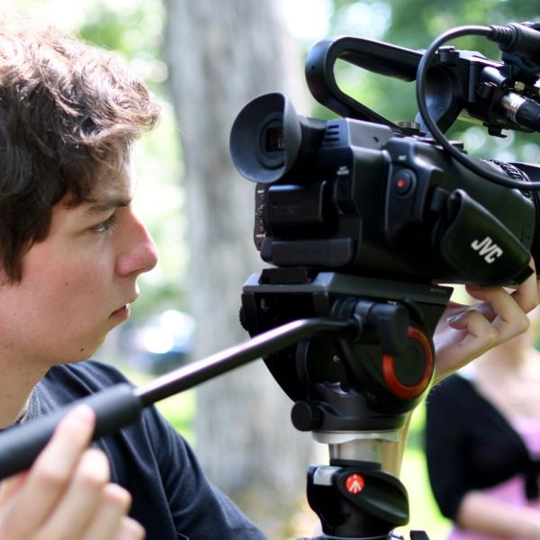 Stephen Callcott sets up a shot during a video session.