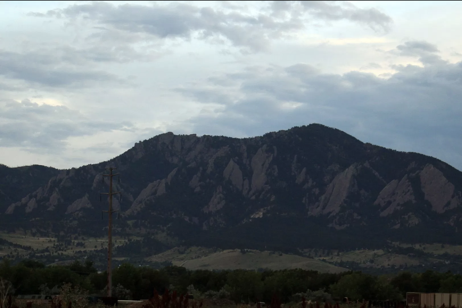 Across the street from the Valmont Coal Power Station is an open view of the flatirons. About 20 percent of forests in North America have been permanently demolished for agriculture or other uses.