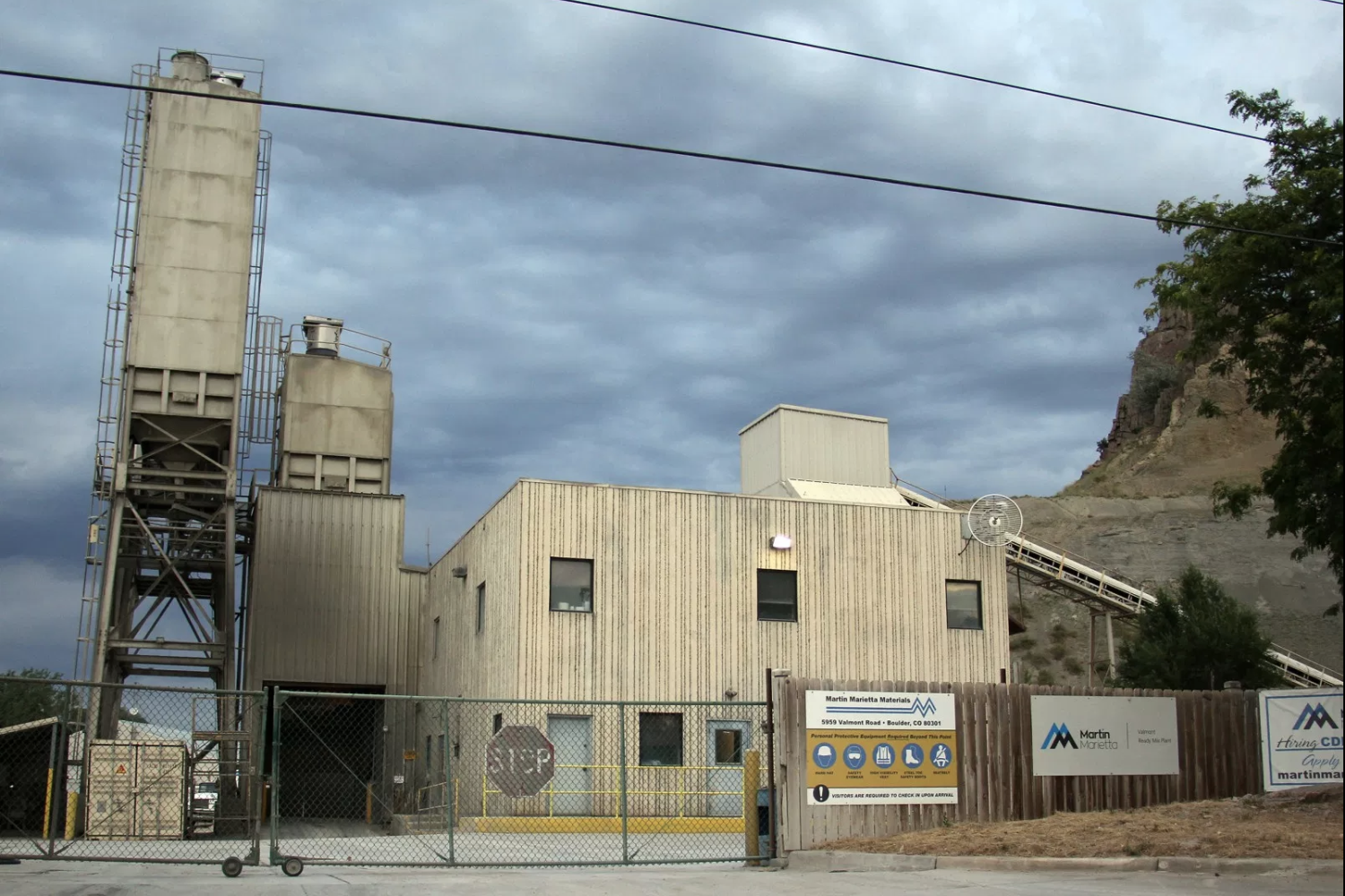 Martin Marietta, an industrial materials supplier, sits next to a hazerdous waste disposal site. It sells gravel, sand, concrete and other such supplies. According to the Environmental Protection Agency, it releases particulates that can travel great distances to both water and air.