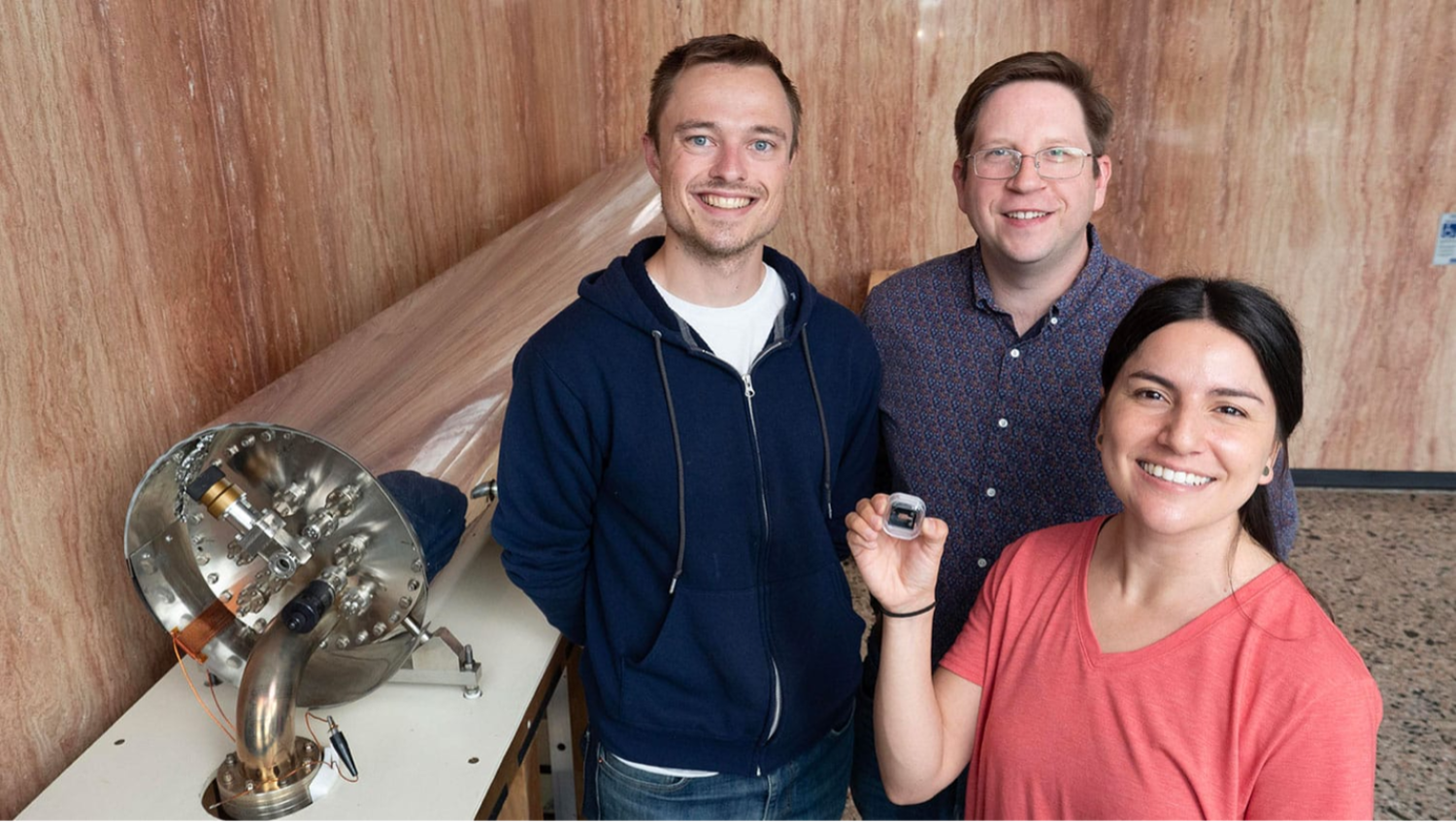 Alexander Staron, William McGehee and Gabriela Martinez pictured with the chip-scale atomic beam device