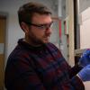 NIST and CU Boulder research Sam Oberdick tests nanoparticles in liquid solution
