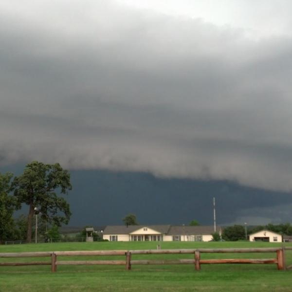 A "wall cloud" approaching our location as we chased tornadoes with the Center for Severe Weather Research (CSWR) on 30 May 2013. Wall clouds form from the outflow of rain-cooled air from thunderstorms, which creates a gust front that moves outward from the thunderstorm further lifting warm moist air ahead of it and feeding the thunderstorm.