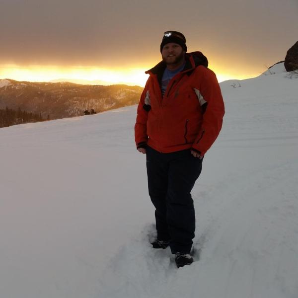 Graduate student Josh Aikins enjoying a mountaintop sunset from the Packer John location (7,000 ft elevation) in central Idaho on 30 January 2017 prior to an incoming storm. Josh was deployed on this mountaintop location between January and March 2017 as part of the SNOWIE field project, which aimed to observe the impacts of cloud seeding on snow production within the Payette River Basin of Idaho.