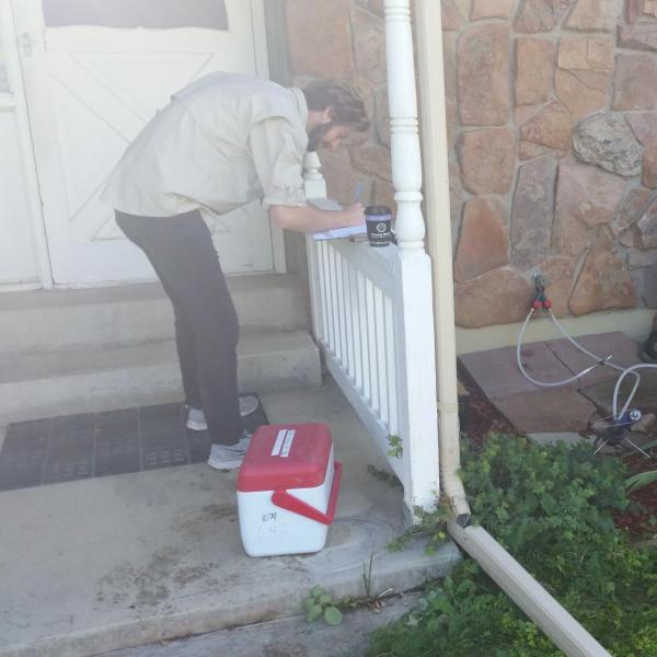 Graduate student, John Stults, working on a well water project in east Boulder County.