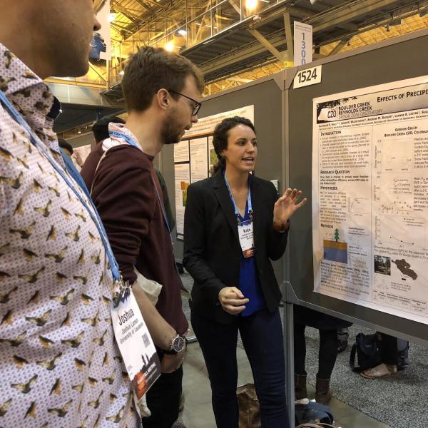 Graduate student Katherine Hale presenting work in poster form during the 2017 AGU conference in New Orleans.