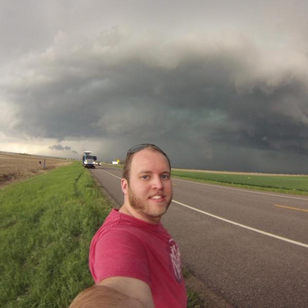 A selfie with a supercell thunderstorm and a Doppler On Wheels (DOW) mobile radar as we wait to see if a tornado will form. The goal was to place tornado "pods" in front of any tornado that forms while collecting radar data at the same time.