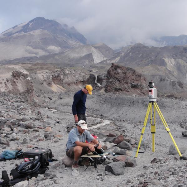 Faculty member John Pitlick and UNAVCO engineer Jim Normadeau using ground-based LiDAR to scan the topography of the North Fork Toutle River near Mount St. Helens, WA. Aug. 2010.