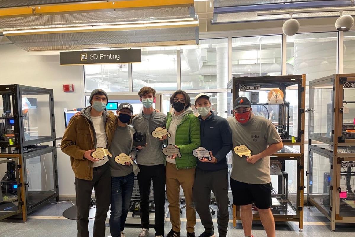 Mountable Wind Turbine for Vehicles group pose with their win