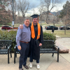 Luke Waeldner poses on graduation day in cap and gown