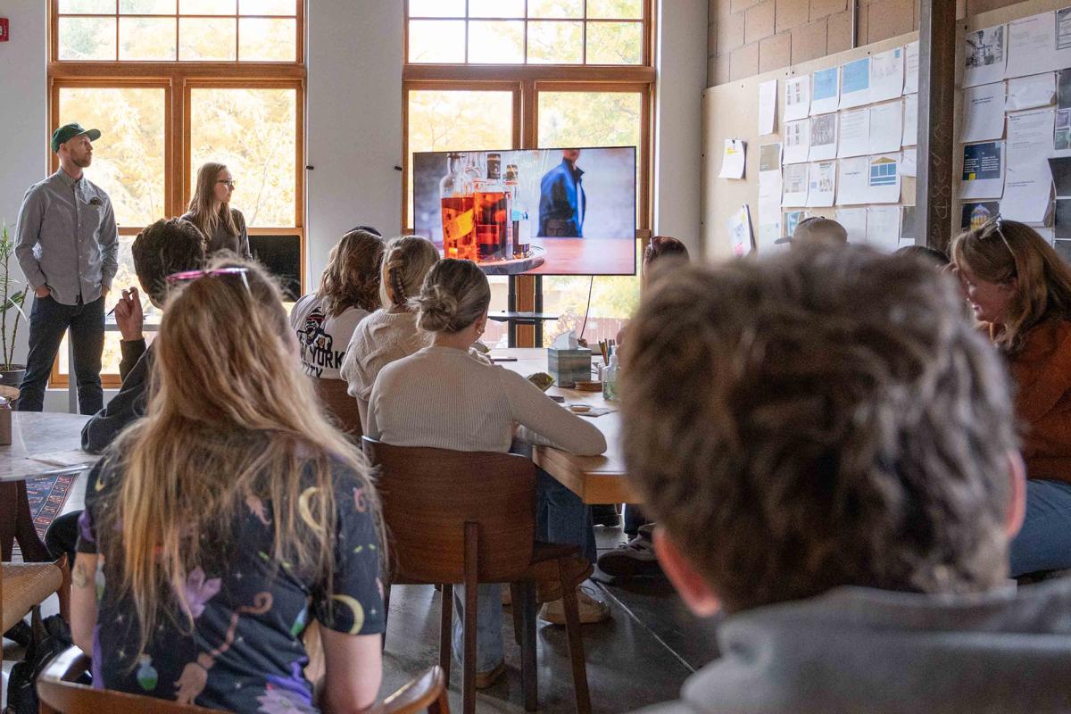 Students watch a presentation