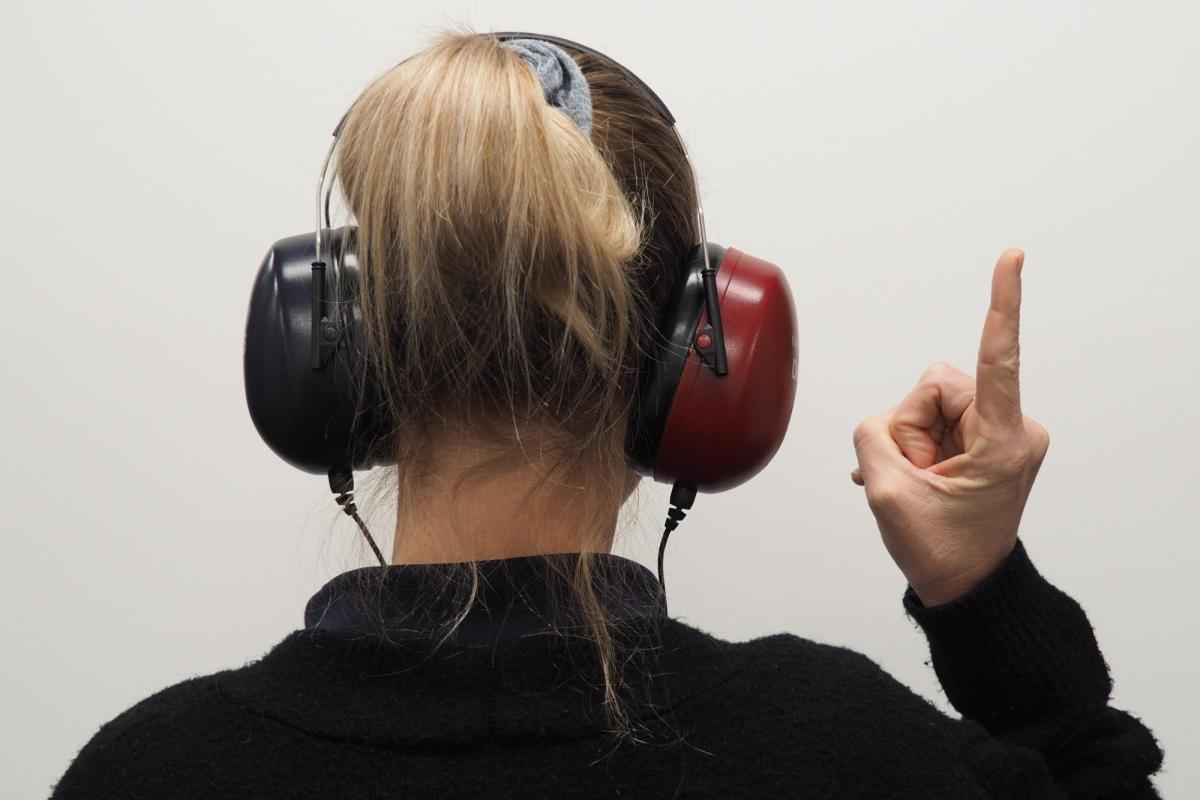 A person undergoing a hearing test.