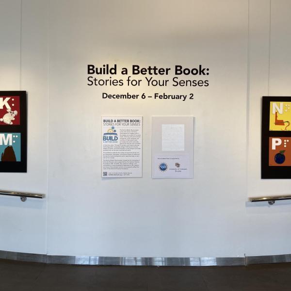 Exhibit title wall and tactile alphabet boards