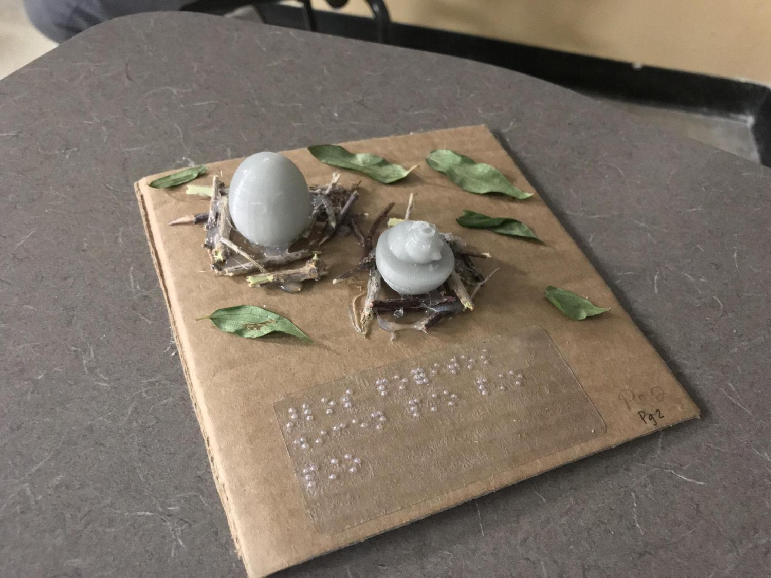3D Model of a hatching chicken and an egg in a nest.