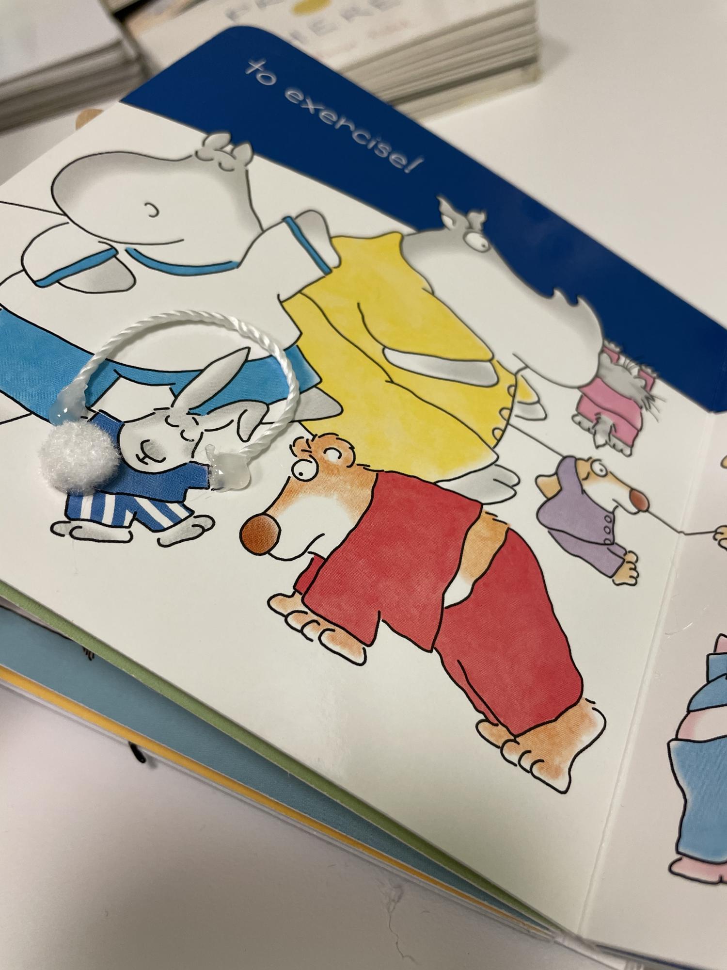 Tactile page with textures for a rabbit jumping rope.