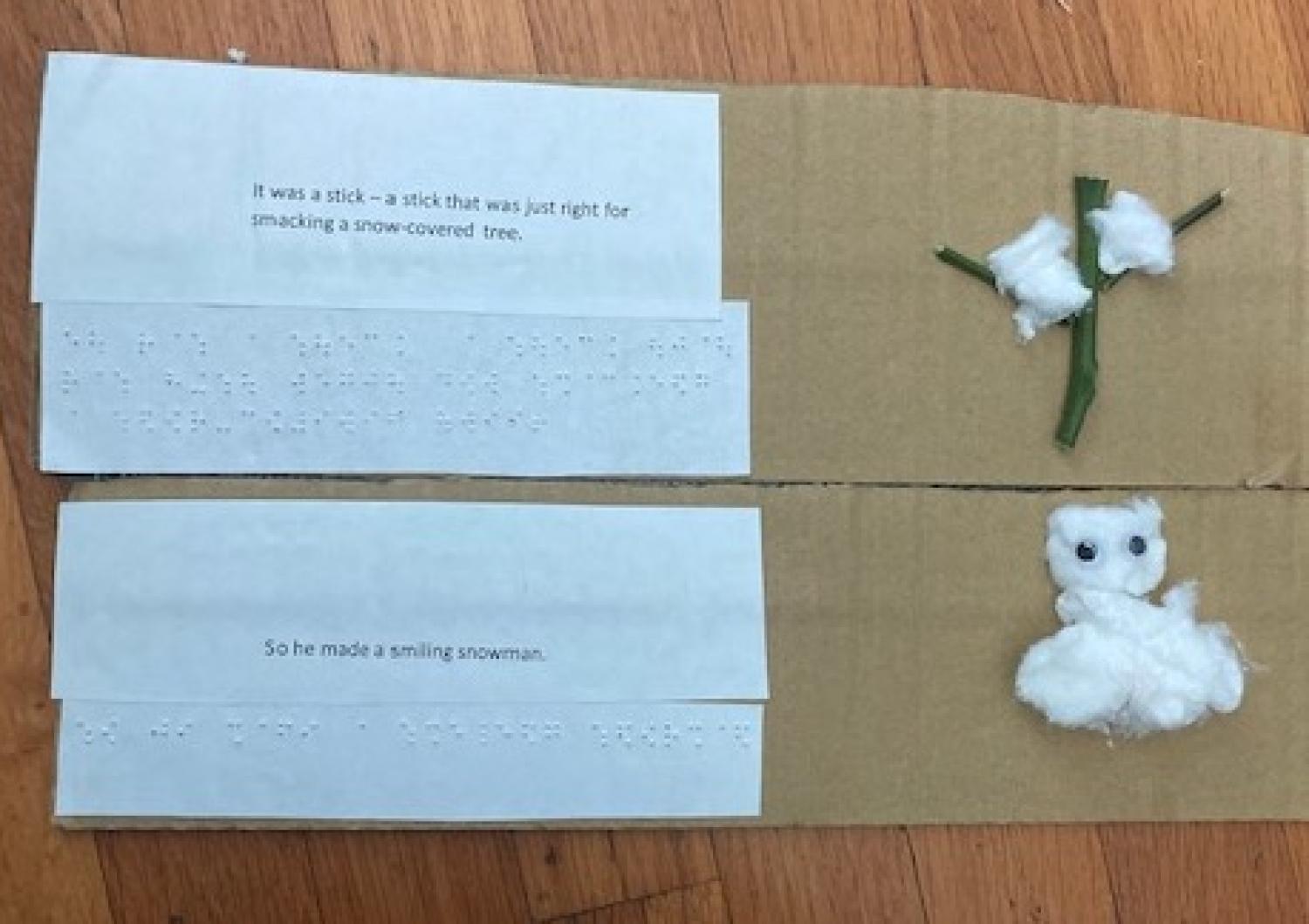 page with braille text and a tactile tree, and a snowman