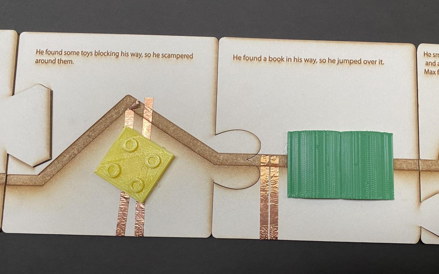 Story showing path going around a toy block and with a book covering path.