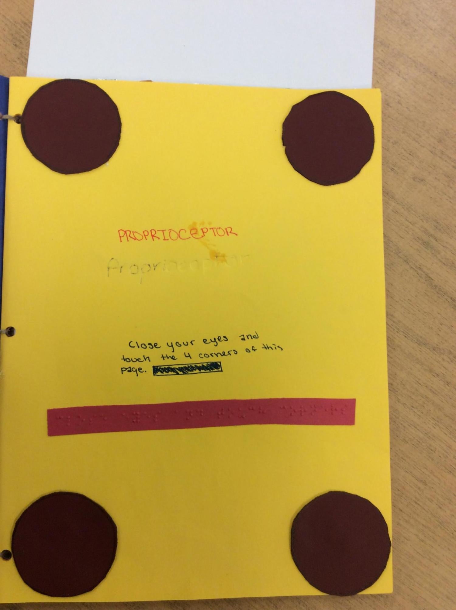 Page for proprioceptors with four tactile circles in the corners of the page.