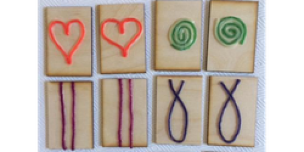 Wooden cards with raised designs and patterns
