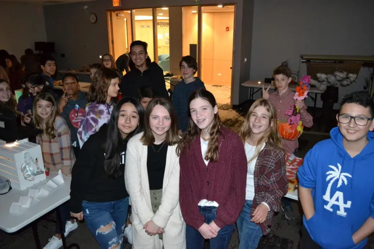 Group of kids smiling for the camera