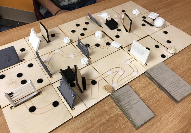 Tactile board game using laser cut pieces