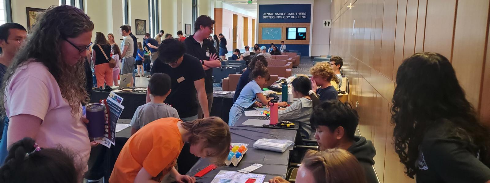 People doing activities at NSF STEM Day