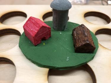 3D printed barn, silo, and cabin for Enchanted Forest board game.