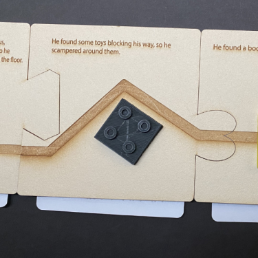 Board book pages attached together by puzzle cut outs on each page