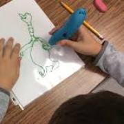 Student using 3D pen to trace characters from the book Sneetches by Dr. Seuss