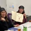Analiza and Jackie showing their tactile tree drawing during the Build a Better Book workshop.